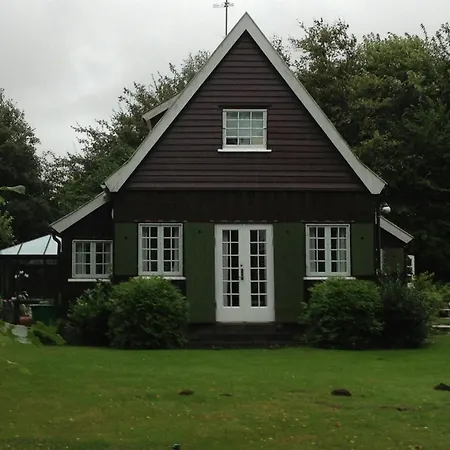 Holiday home Wooden House From 1921 Near The Sea In *